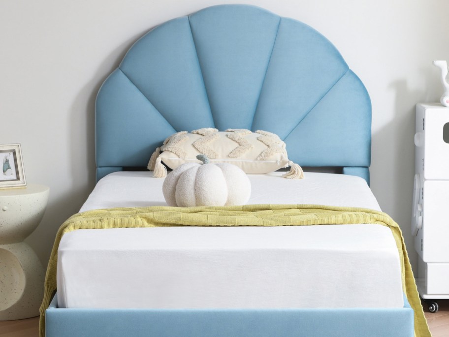 Upholstered platform bed in blue