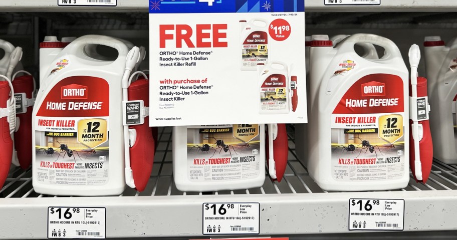 bottles of ORTHO 1-Gallon Home Defense Insect Killer on store shelf with BOGO sale sign