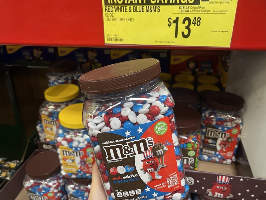 Red White & Blue M&Ms 62oz Jar in Sam's Club being held by a woman