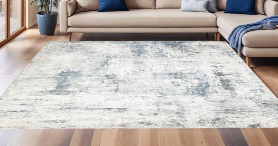 blue and white abstract rug in living room