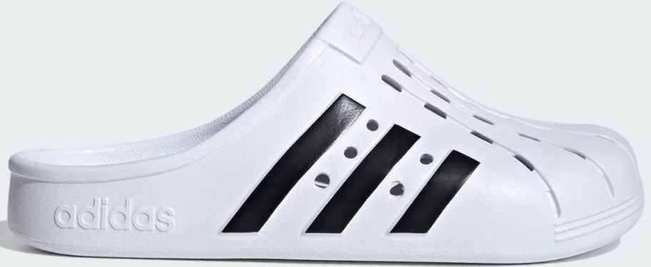 a white eva clog shoe with black stripes