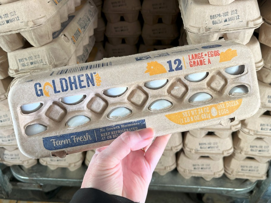 holding a dozen eggs at Aldi