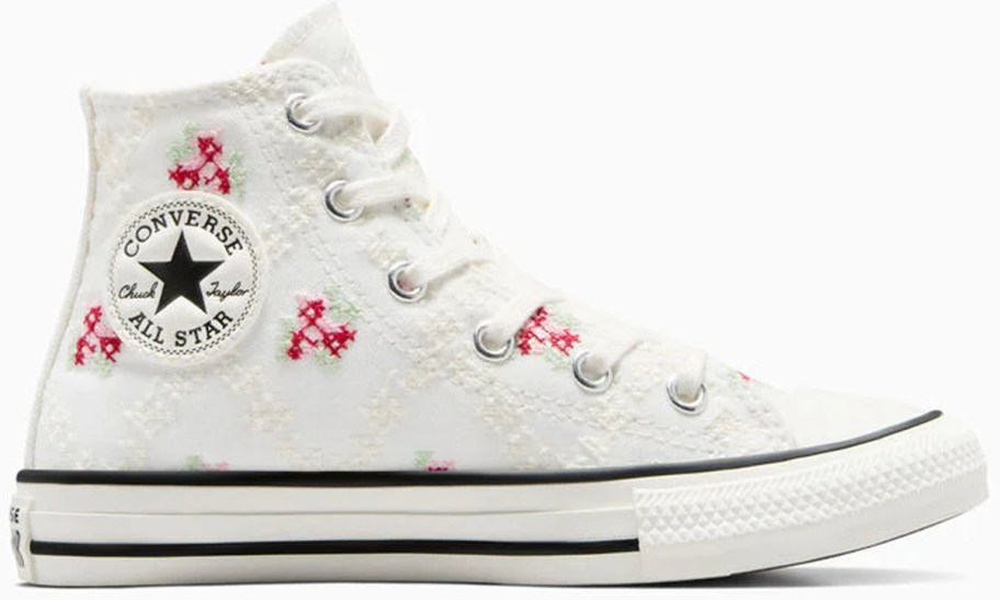 white high top converse shoe with rose print 