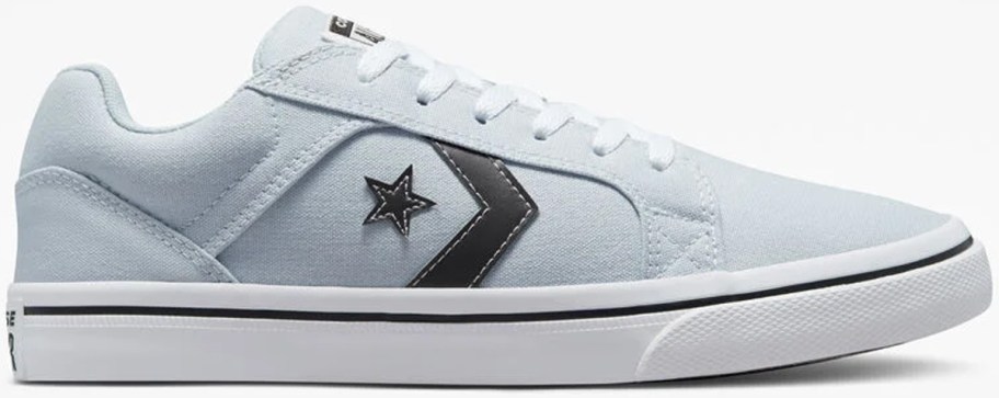 blue low top converse shoe