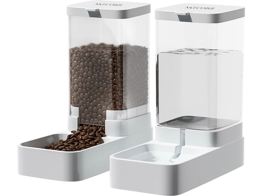 two white gravity water and feed containers