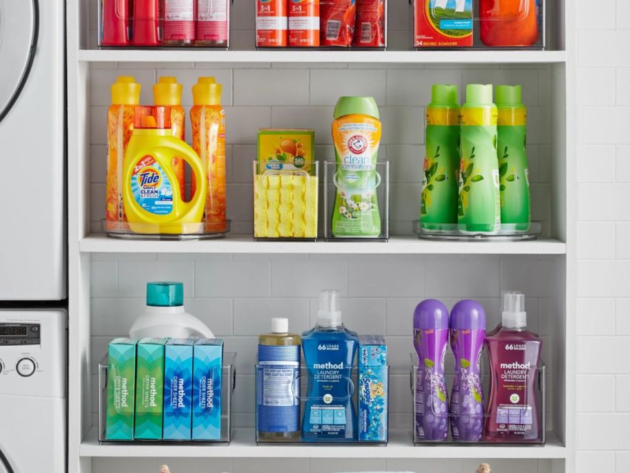 The Home Edit 10-Piece Laundry Edit containers in laundry room with laundry products in them on shelves