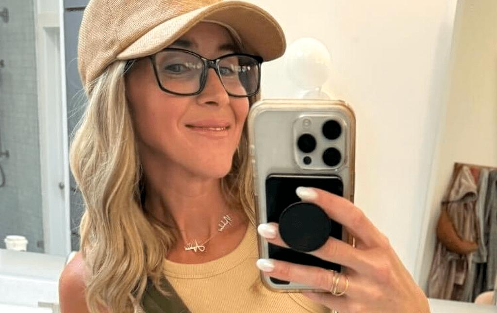 woman wearing name necklace 
