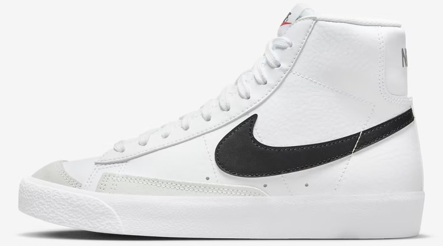 white and black nike high top shoe