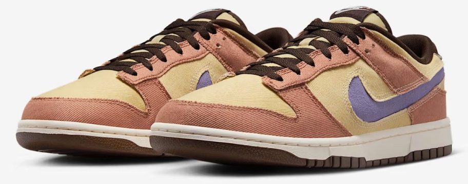 beige and purple nike dunks shoes stock image