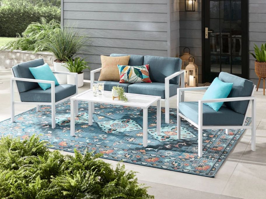 blue and white Mainstays Dashwood 4-Piece Patio Conversation Set on patio