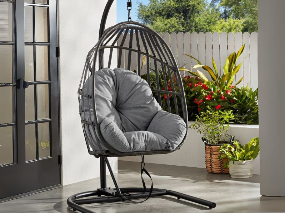 grey Mainstays Wicker Patio Hanging Egg Chair on patio