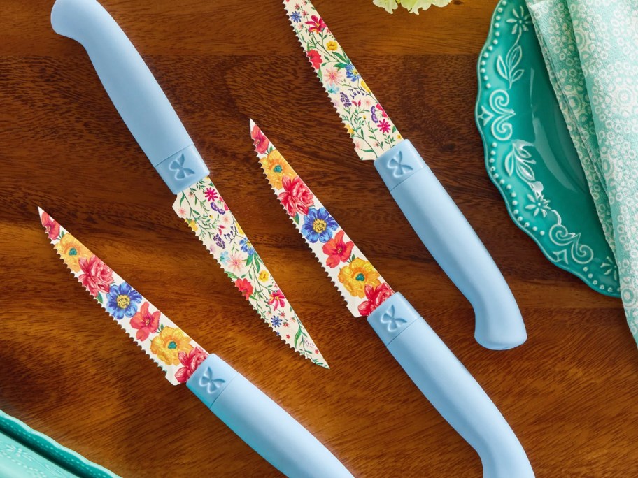 pioneer woman blue and floral knives on table