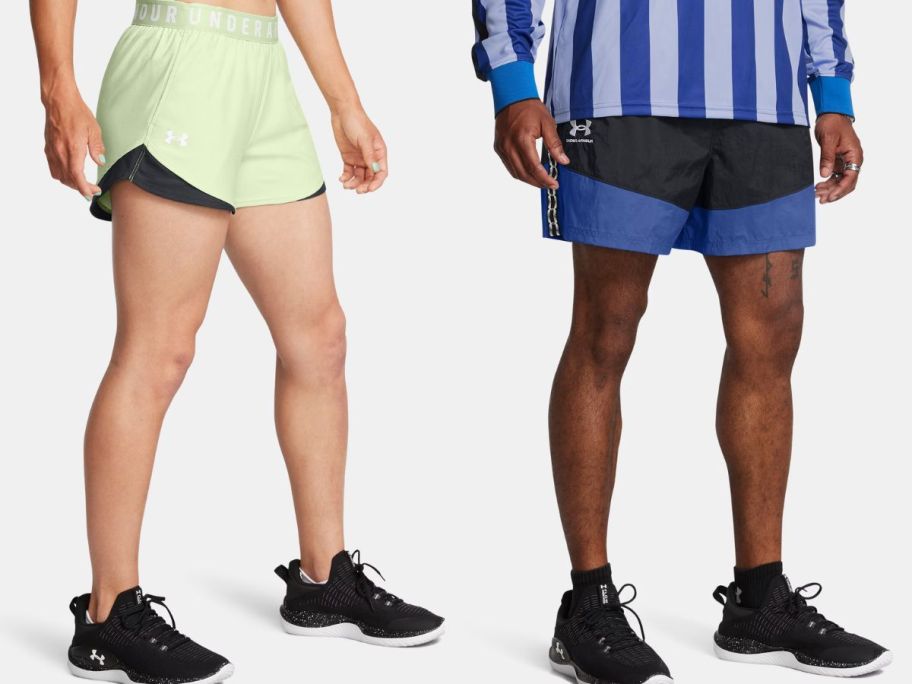 a woman wearing yellow and black under armour shorts and a man wearing black and blue under armour shorts