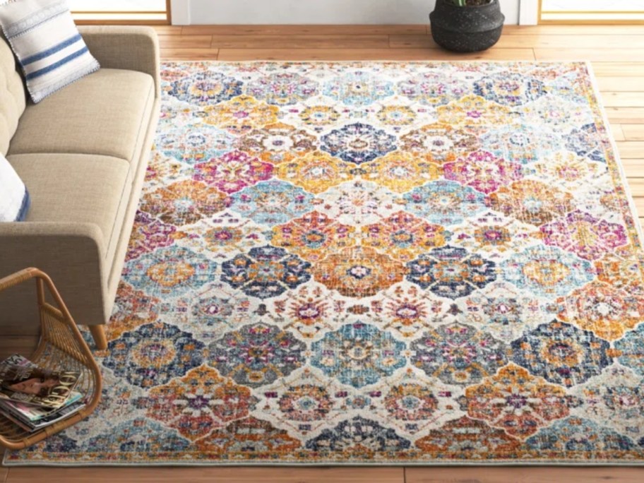 a colorful oriental style rug in a living room