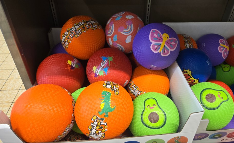 different color rubber balls inside of box