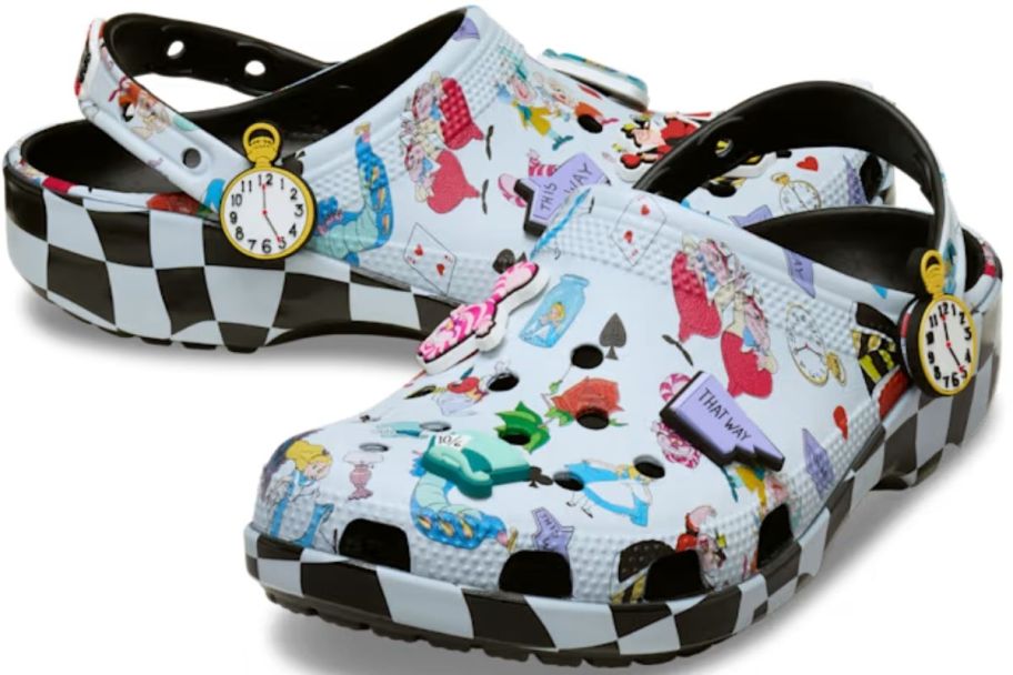 a pair of alice in wonderland themed crocs with jibits