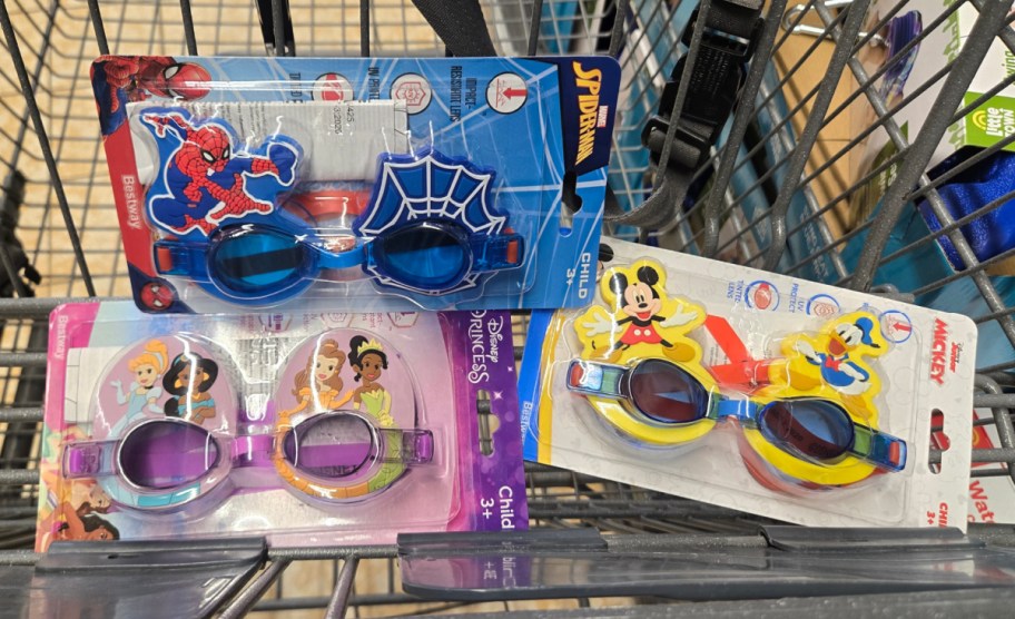 Disney character goggles displayed inside of shopping cart