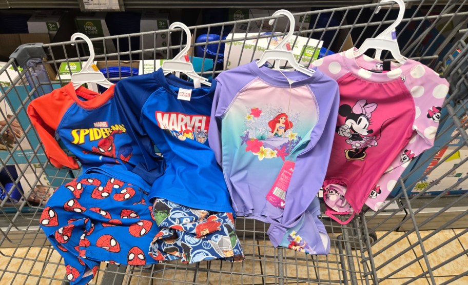 Disney swimsuit sets displayed on shopping cart 