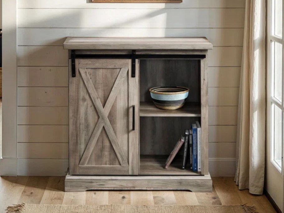 rustic barn door sliding style accent table in a hallway