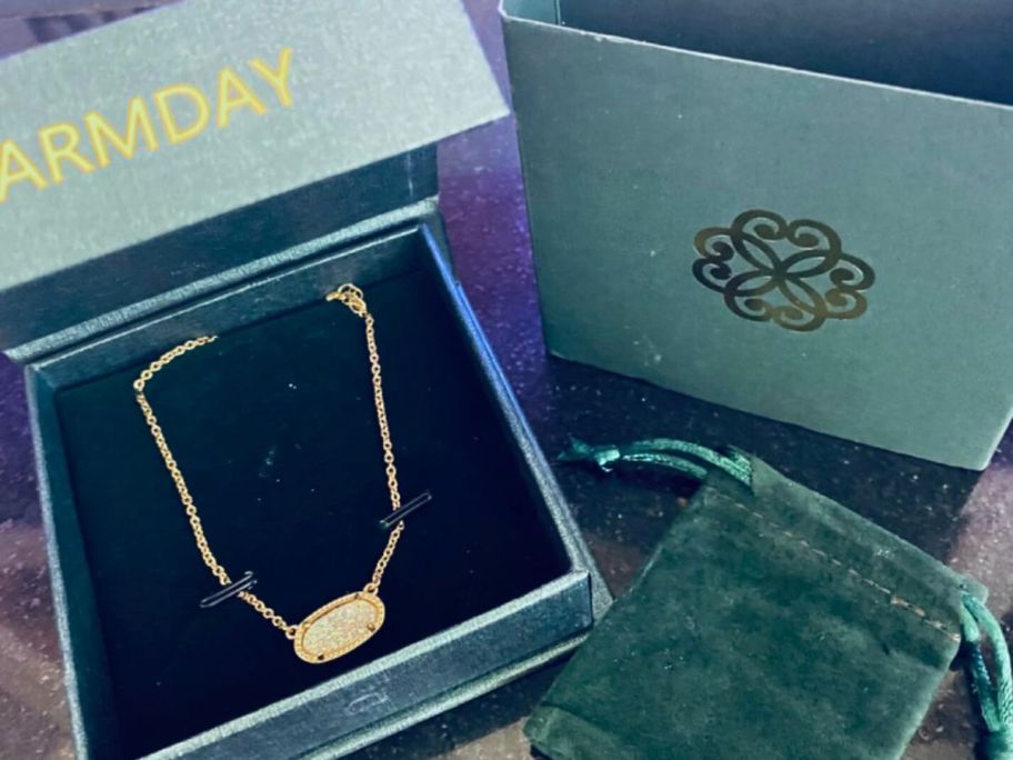 A box with a Kendra Scott inspired necklace inside