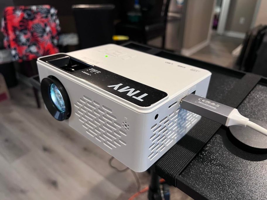 close up of white TMY Mini Outdoor Projector