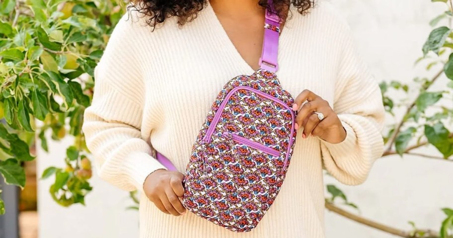 Vera Bradley Outlet Sling Bag being worn by a woman