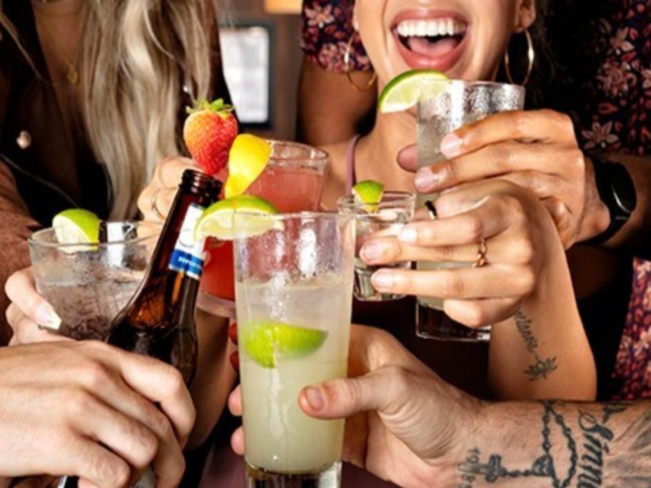 raising beverages in a toast