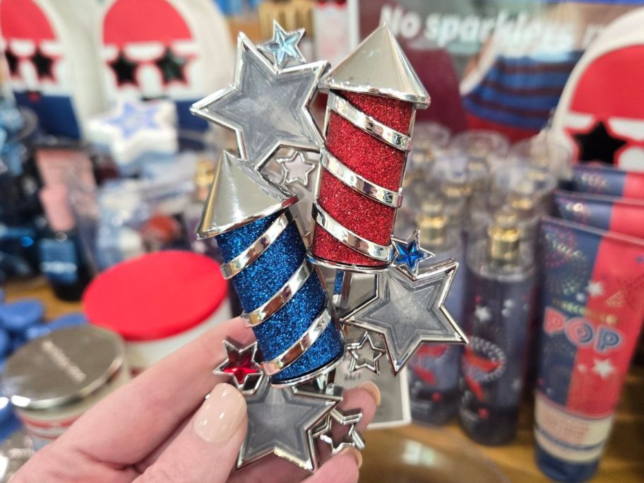 Bath & Body Works Firecracker Pop Projector Wallflower in hand in store
