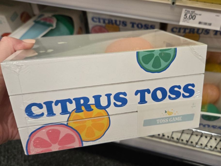 Citrus Toss Game box in hand in store