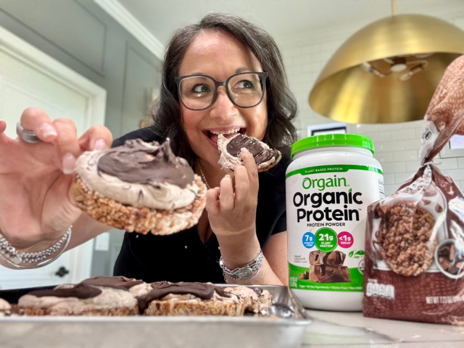eating a high protein s'more on a rice cake
