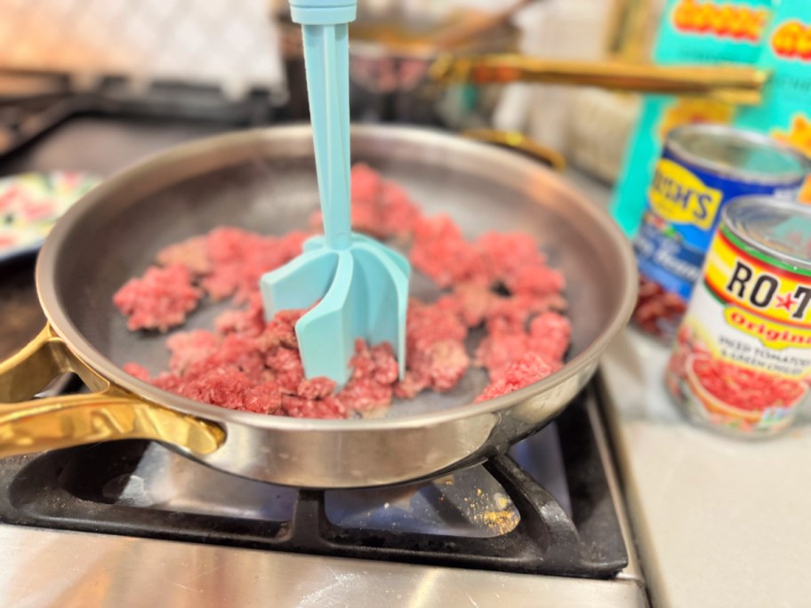ground beef cooking in a skillet
