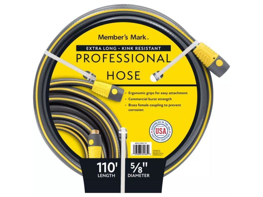 black and yellow Member's Mark 110' Professional Garden Hose stock image