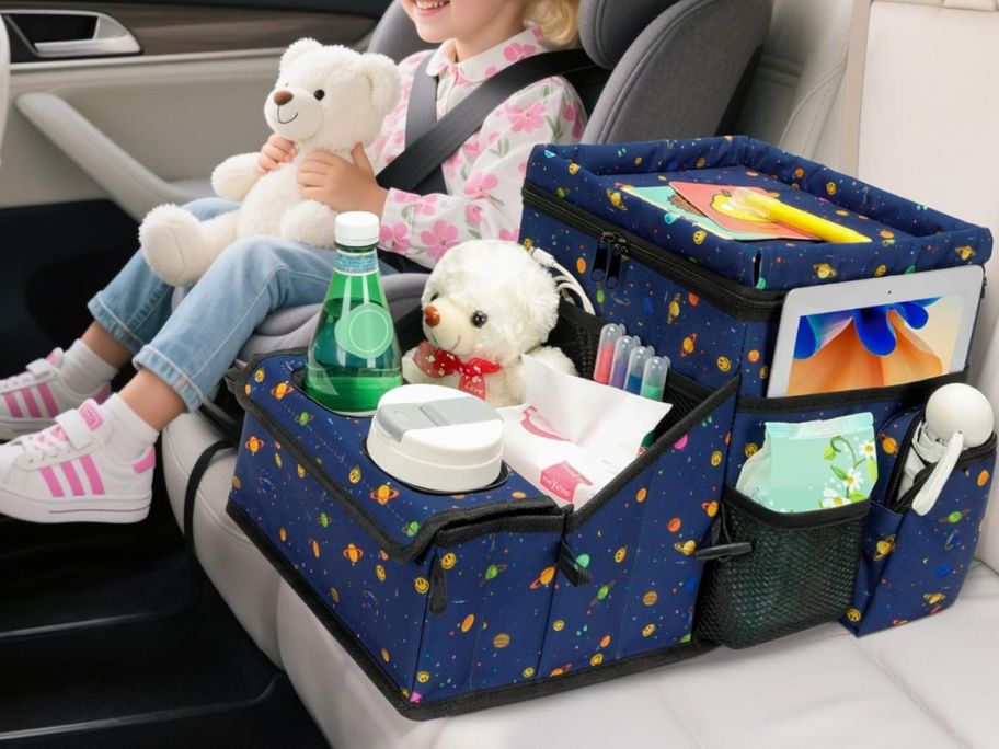 Car Seat Organizer on car seat filled with drinks, wipes, and more