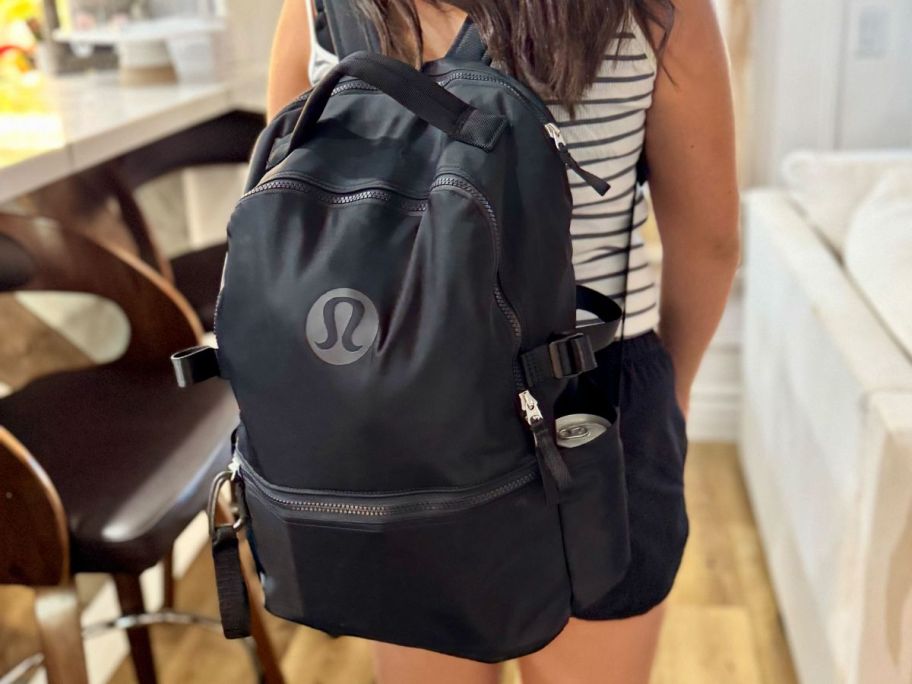 Girl wearing a lululemon backpack