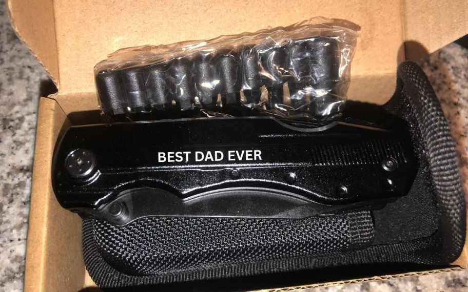 a multitool knife set shown with bit set and belt case