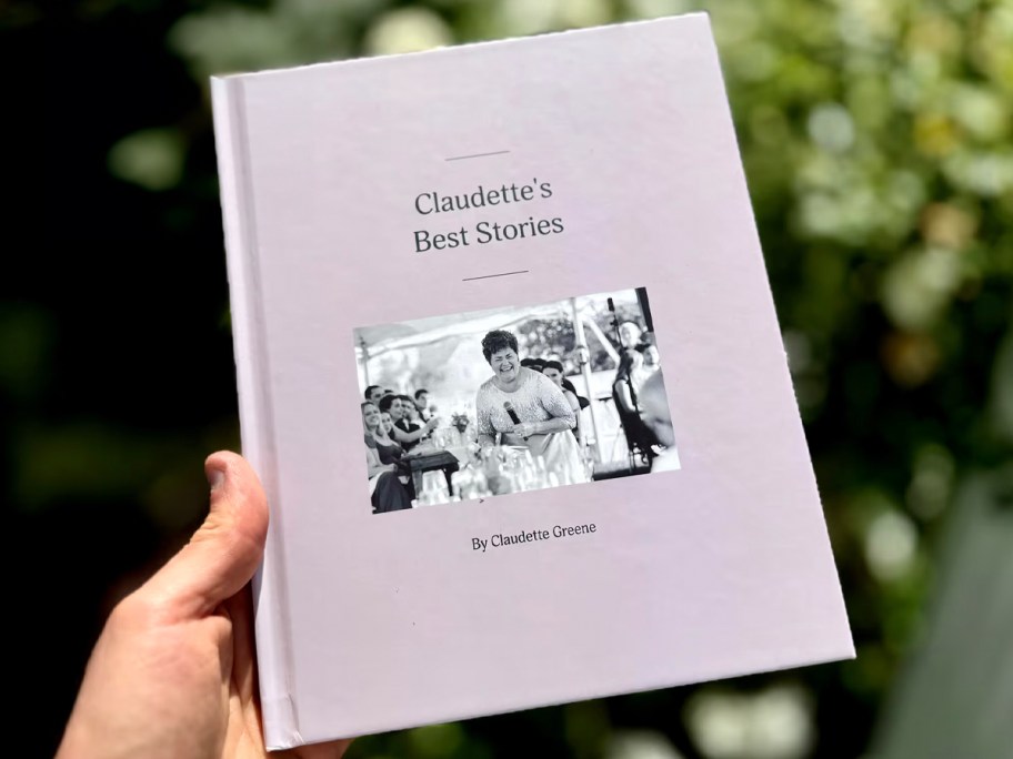 hand holding remento book 