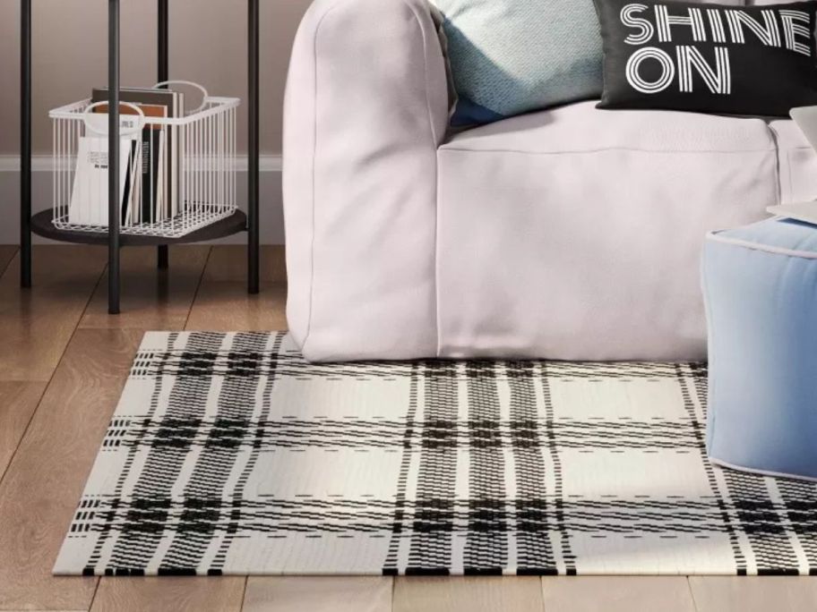 black and white plaid Handwoven Area Rug on floor in living room