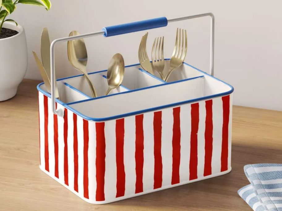 red and white striped Room Essentials Caddy Metal Utensil Storage container with utensils in it on counter