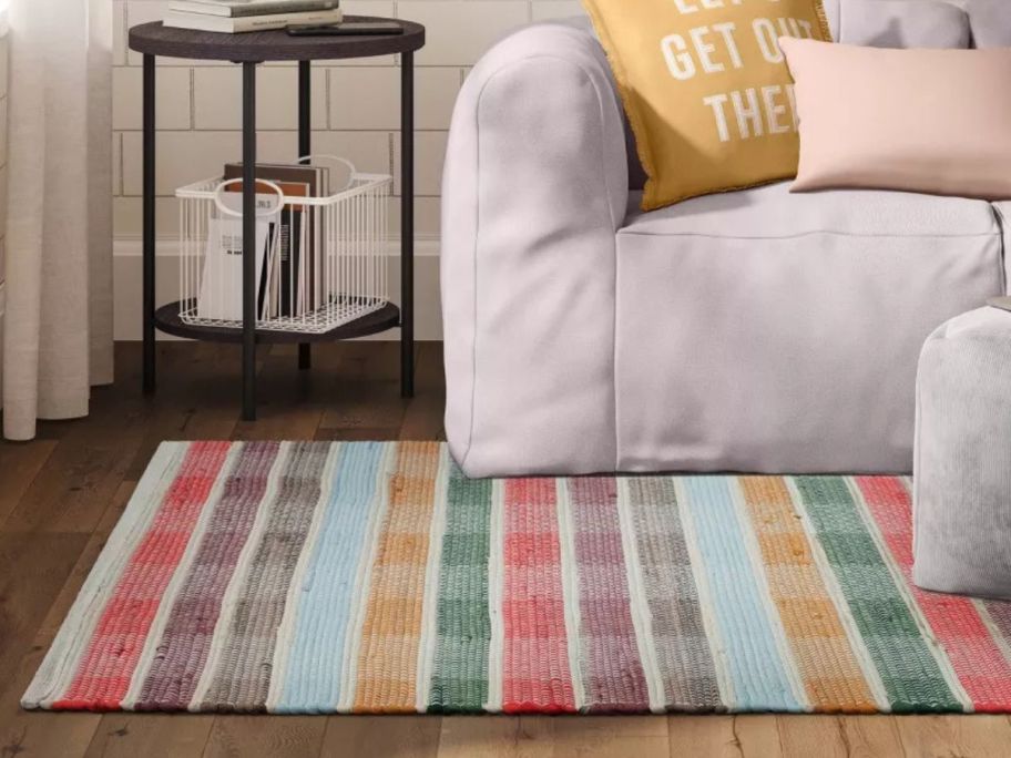 multicolored Handwoven Area Rug on floor in living room