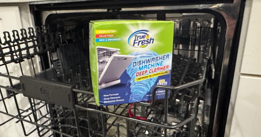 a box of True Fresh Dishwasher Cleaner Tablets sitting in the top rack of a dishwasher