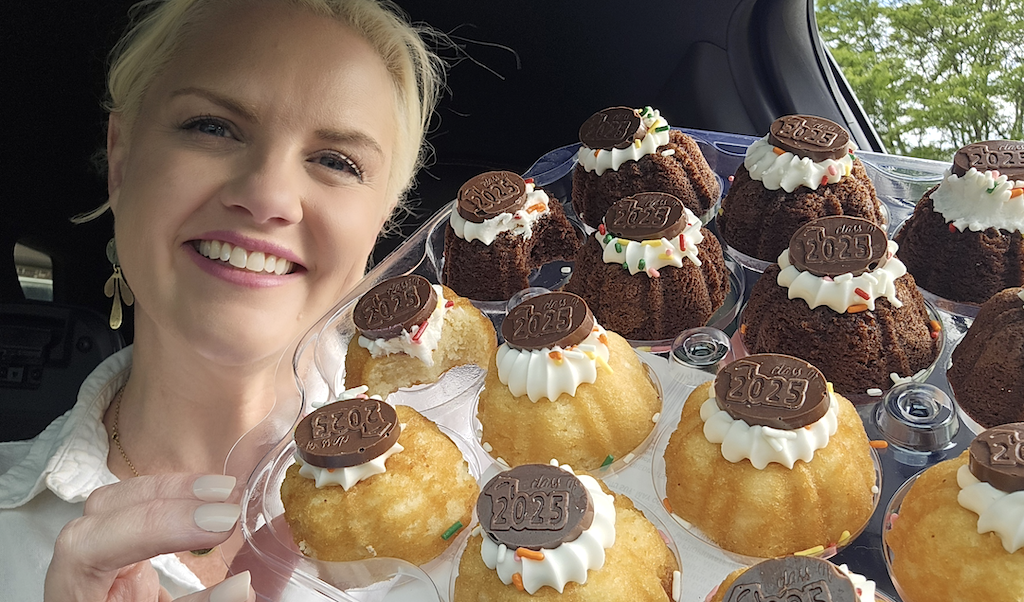 woman holding Walmart bundt cakes 